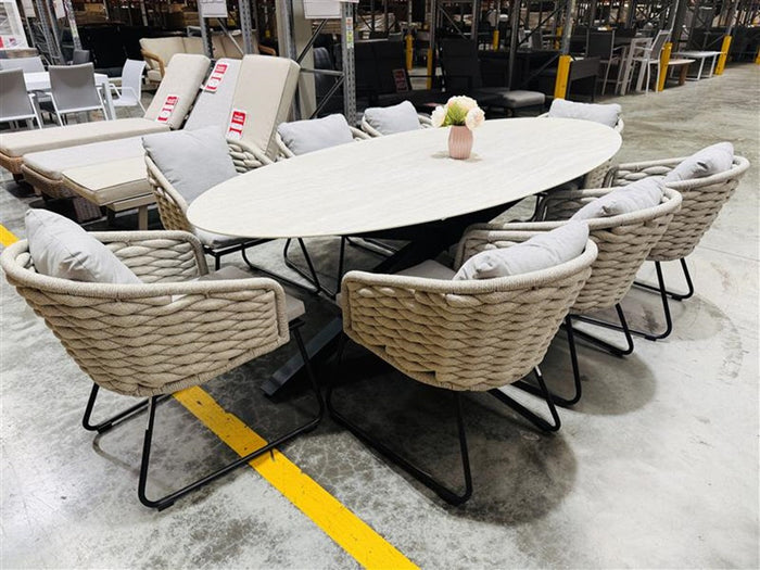 Beige Stone Top Oval Outdoor Table with 8 Matching Chairs